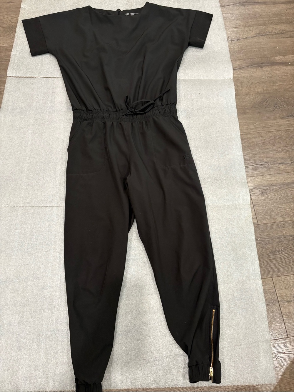 Albion Black Short-Sleeve V-Neck Jumpsuit with Ankle Zips